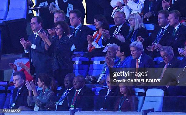 French President Francois Hollande and his councillor for sports Nathalie Iannetta , Dutch Prime Minister Mark Rutte , US Secretary of State John...