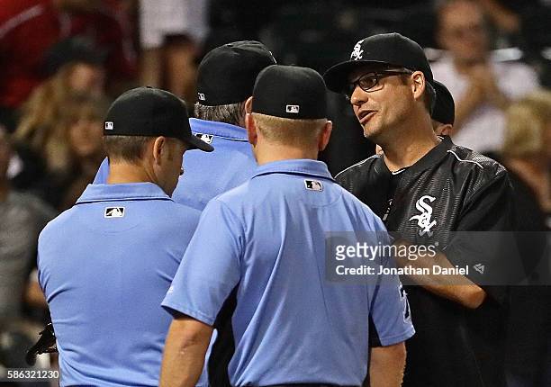 Manager Robin Ventura of the Chicago White Sox argeus with umpires at the end of a game against the Baltimore Orioles at U.S. Cellular Field on...