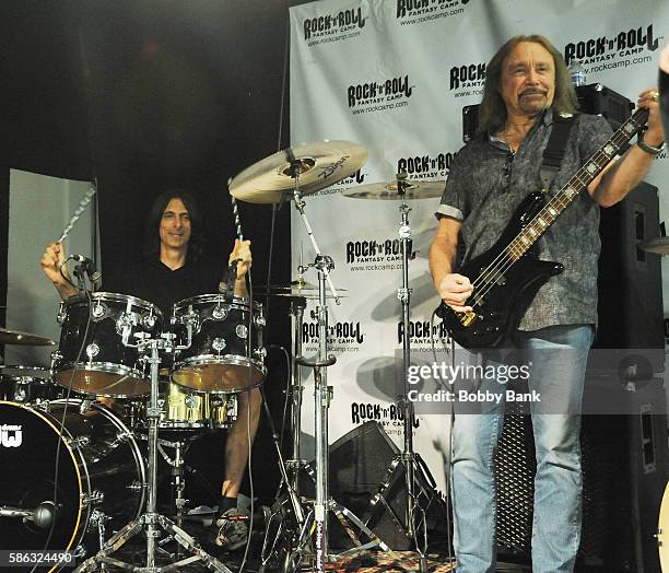 Musicians Scott Travisl and Ian Hill of Judas Priest attend Rock And Roll Fantasy Camp at Amp Rehearsal on August 5, 2016 in North Hollywood,...