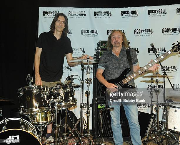 Musicians Scott Travisl and Ian Hill of Judas Priest attend Rock And Roll Fantasy Camp at Amp Rehearsal on August 5, 2016 in North Hollywood,...