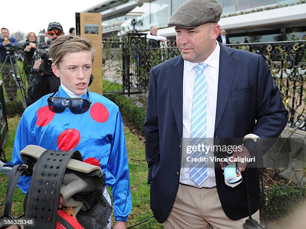 Owner Peter Moody is congratulated by another part owner after Ulmann won Race 5, during Melbourne racing at Flemington Racecourse on August 6, 2016...