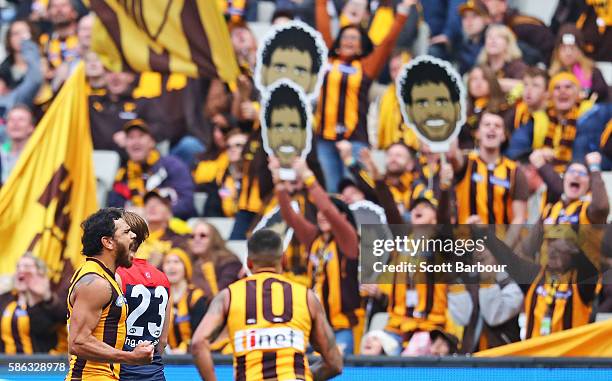 Cyril Rioli of the Hawks celebrates after kicking a goal during the round 20 AFL match between the Melbourne Demons and the Hawthorn Hawks at...