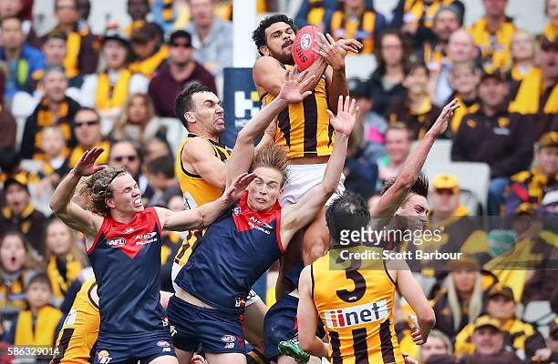 Cyril Rioli of the Hawks takes a spectacular mark in the 2nd quarter during the round 20 AFL match between the Melbourne Demons and the Hawthorn...