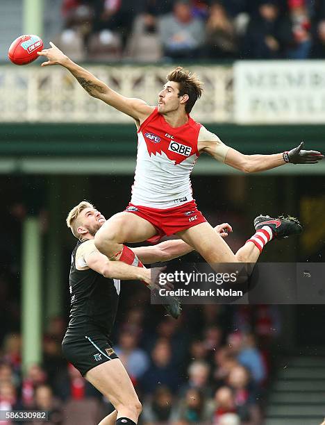 Sam Naismith of the Swans contests possession during the round 20 AFL match between the Sydney Swans and the Port Adelaide Power at Sydney Cricket...