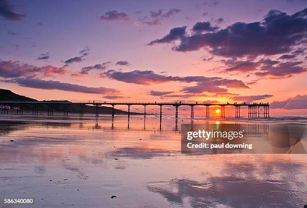 reflecting on a lovely evening - saltburn stock pictures, royalty-free photos & images