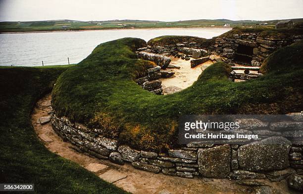 Neolithic Village of Skara Brae, Orkney, Scotland, 20th century. Stone-built Neolithic settlement, on the Bay of Skaill consisting of eight clustered...