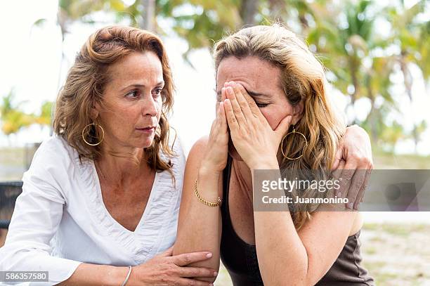 comforting friend - consoling stock pictures, royalty-free photos & images