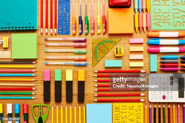 office and school supplies arranged on wooden table - knolling - knolling tools stock pictures, royalty-free photos & images