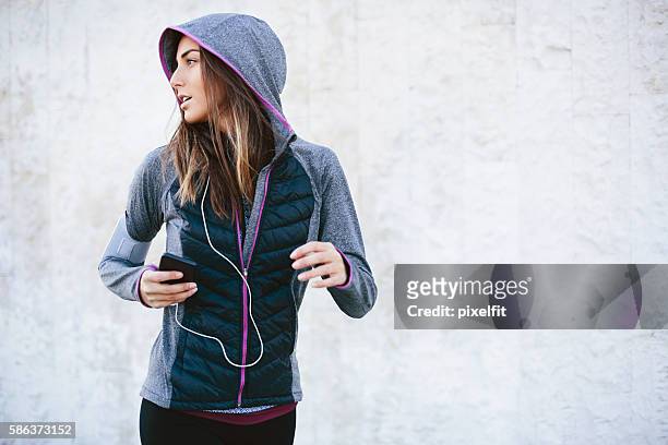 jogger - hood clothing stock pictures, royalty-free photos & images