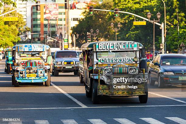 jeepneys in ermita - philippines jeepney stock pictures, royalty-free photos & images