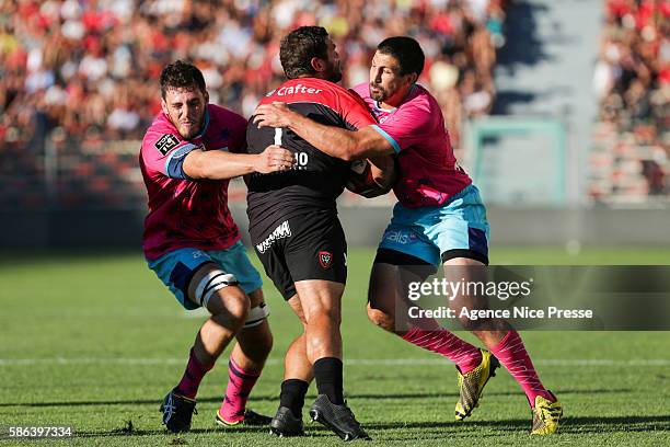 Paul Gabrillagues of Stade Francais , Florian Fresia of RC Toulon and Paul Williams of Stade Francais during a friendly match between Toulon and...