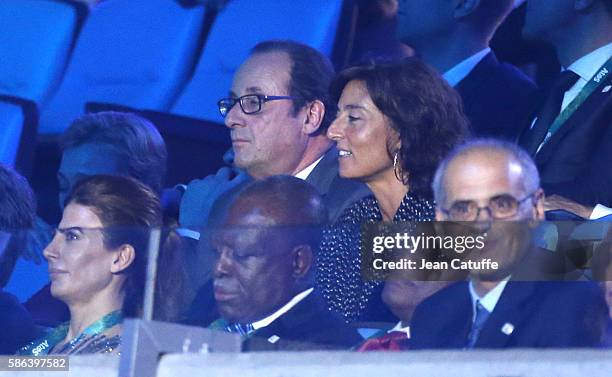 President of France Francois Hollande and his sports adviser Nathalie Iannetta attend the opening ceremony of the 2016 Summer Olympics at Maracana...