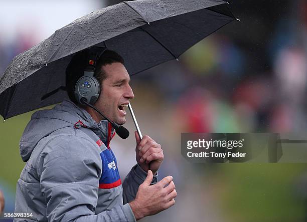 Danny Buderus of the Knights shouts instructions to the Knights players during the round 22 NRL match between the Newcastle Knights and the...