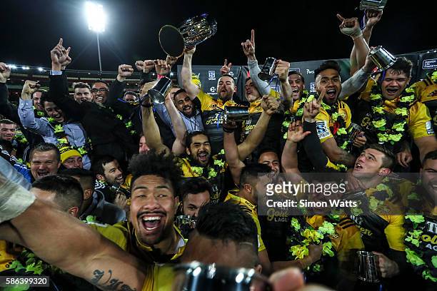 The Hurricanes celebrate after winning the 2016 Super Rugby Final match between the Hurricanes and the Lions at Westpac Stadium on August 6, 2016 in...