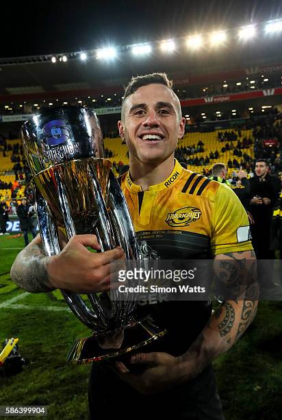 Perenara of the Hurricanes celebrates with the Super Rugby trophy after the Hurricanes won the 2016 Super Rugby Final match between the Hurricanes...