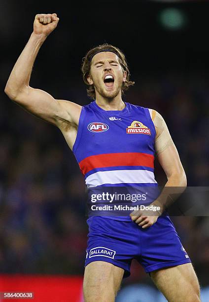 Marcus Bontempelli of the Bulldogs celebrates a goal during the round 20 AFL match between the Western Bulldogs and the North Melbourne Kangaroos at...