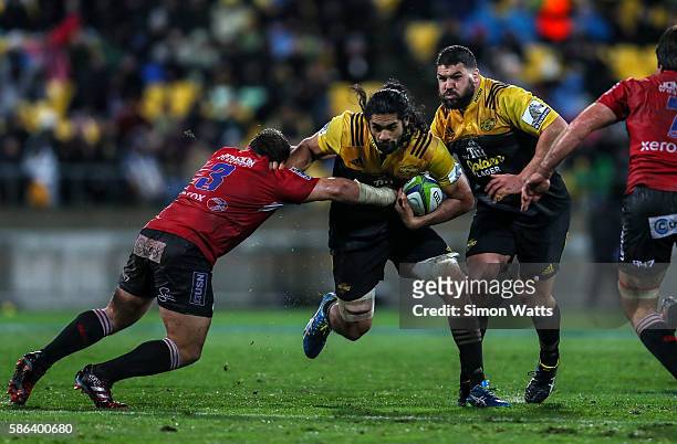 Michael Fatialofa of the Hurricanes makes a break during the 2016 Super Rugby Final match between the Hurricanes and the Lions at Westpac Stadium on...
