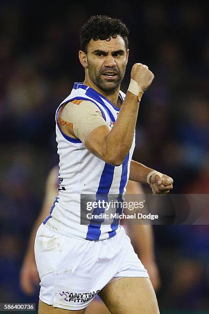 Lindsay Thomas of the Kangaroos celebrates a goal during the round 20 AFL match between the Western Bulldogs and the North Melbourne Kangaroos at...