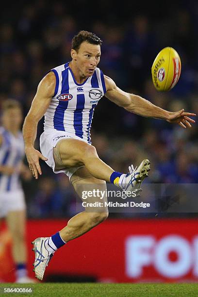 Brent Harvey of the Kangaroos kicks the ball during the round 20 AFL match between the Western Bulldogs and the North Melbourne Kangaroos at Etihad...