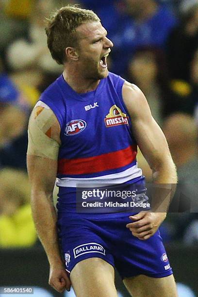 Jake Stringer of the Bulldogs celebrates a goal during the round 20 AFL match between the Western Bulldogs and the North Melbourne Kangaroos at...