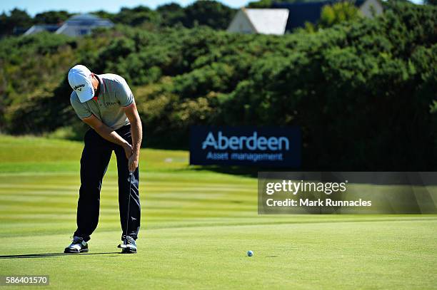 Alex Noren of Sweden putting on the green on hole 15 on day three of the Aberdeen Asset Management Paul Lawrie Matchplay at Archerfield Links Golf...