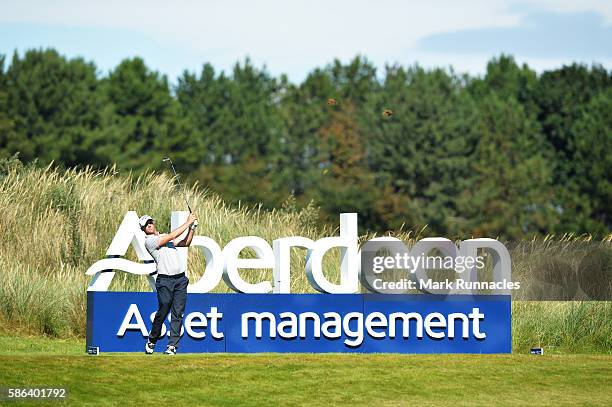 Alex Noren of Sweden takes his tee shot on hole 13 on day three of the Aberdeen Asset Management Paul Lawrie Matchplay at Archerfield Links Golf Club...