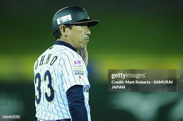 Coach Hisashi Ohno of Japan looks on in the bottom half of the fifth inning in the super round game between Japan and Panama during The 3rd WBSC U-15...