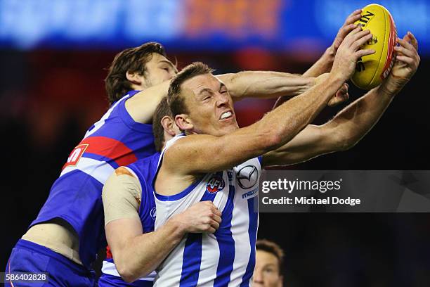 Drew Petrie of the Kangaroos competes for the ball during the round 20 AFL match between the Western Bulldogs and the North Melbourne Kangaroos at...