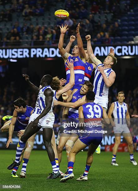 Tom Boyd of the Bulldogs competes for the ball during the round 20 AFL match between the Western Bulldogs and the North Melbourne Kangaroos at Etihad...