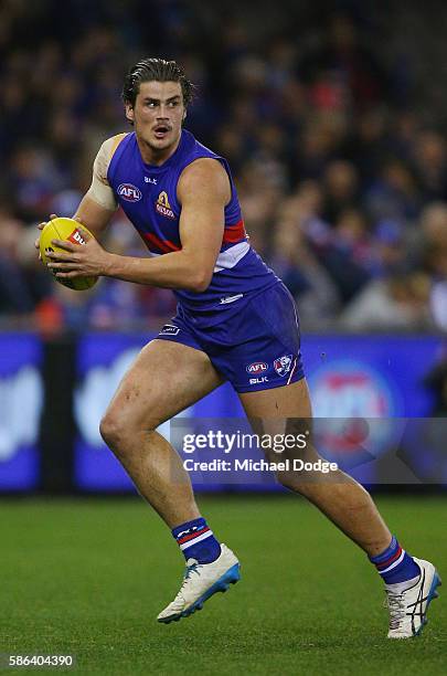 Tom Boyd of the Bulldogs looks upfield during the round 20 AFL match between the Western Bulldogs and the North Melbourne Kangaroos at Etihad Stadium...