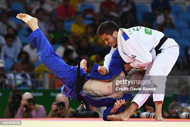 Tobias Englmaier of Germany competes against Francisco Garrigos of Spain in the Men's -60 kg Judo on Day 1 of the Rio 2016 Olympic Games at Carioca...