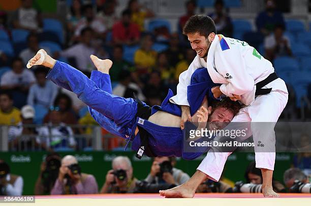 Tobias Englmaier of Germany competes against Francisco Garrigos of Spain in the Men's -60 kg Judo on Day 1 of the Rio 2016 Olympic Games at Carioca...