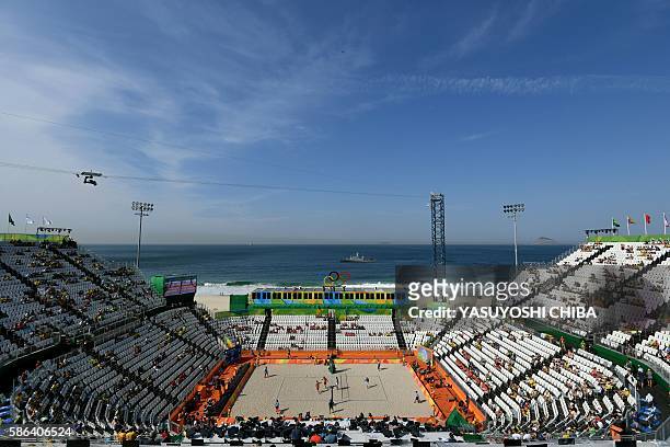 Picture shows the Beach Volley Arena on Copacabana beach in Rio de Janeiro during the men's beach volleyball qualifying match between Italy and...