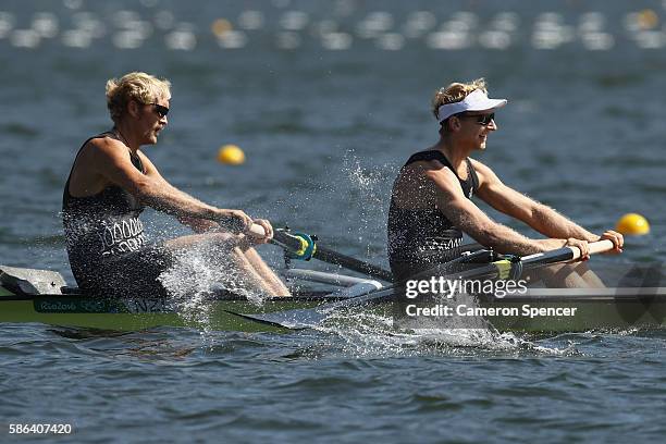 Eric Murray and Hamish Bond of New Zealand compete during the Men's Pair Heat 3 on Day 1 of the Rio 2016 Olympic Games at the Lagoa Stadium on August...