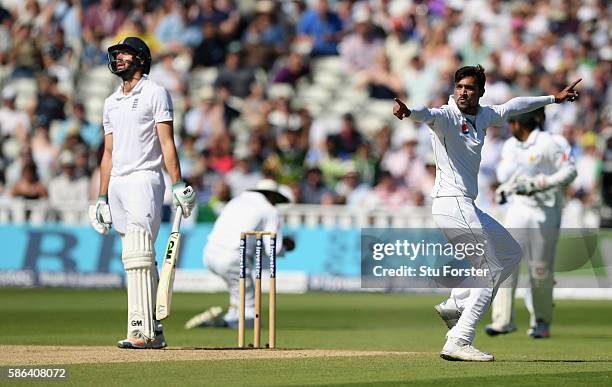 England batsman James Vince reacts as Mohammad Amir celebrates after Vince had been caught at slip by Younis Khan during day 4 of the 3rd Investec...