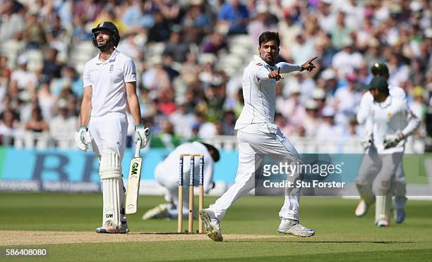 England batsman James Vince reacts as Mohammad Amir celebrates after Vince had been caught at slip by Younis Khan during day 4 of the 3rd Investec...