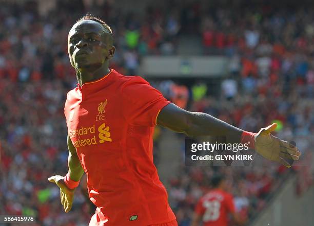 Liverpool's Senegalese midfielder Sadio Mane celebrates after scoring the opening goal of the pre-season International Champions Cup football match...