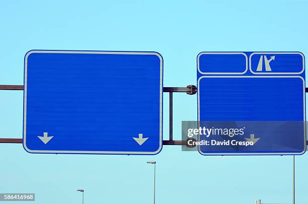 motorway signs - highway exit sign stock pictures, royalty-free photos & images