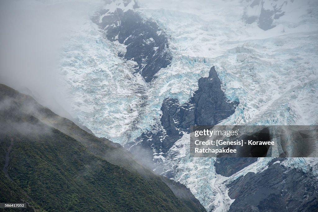 The glacier mountain in the misty day