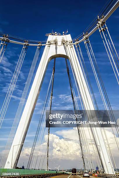 passing on the cable stayed bridge - incheon international airport foto e immagini stock