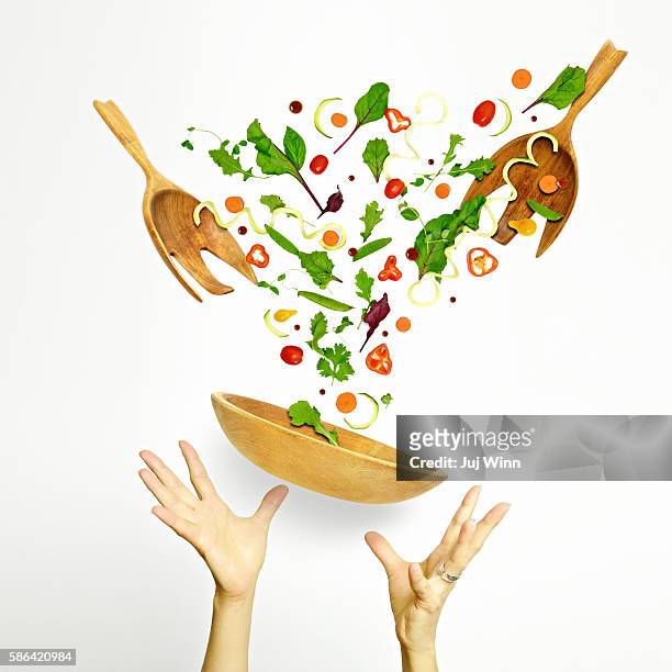 tossed salad - throwing tomatoes stock pictures, royalty-free photos & images