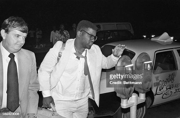 Jury foreman, Lawrence Coffey declines comment as he arrives home after the jury in the trial of John Hinckley Jr. Found him innocent by reason of...