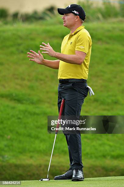 James Morrison of England reacts after leaving a putt short on hole 15 on day three of the Aberdeen Asset Management Paul Lawrie Matchplay at...