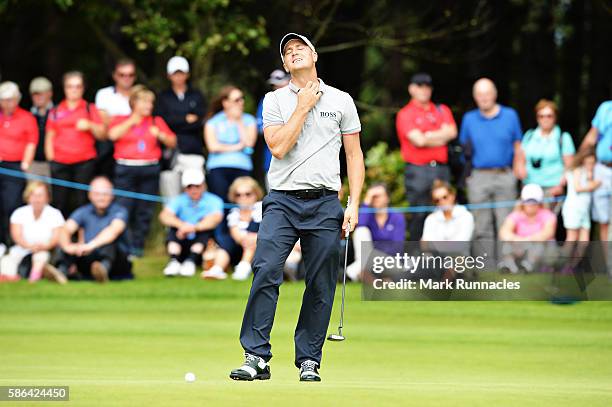 Alex Noren of Sweden reacts after missing a putt on hole 10 on day three of the Aberdeen Asset Management Paul Lawrie Matchplay at Archerfield Links...