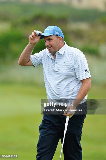 Anthony Wall of England reacts after his final putt on hole 18 on day three of the Aberdeen Asset Management Paul Lawrie Matchplay at Archerfield...