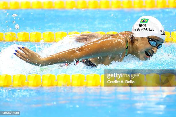 Daynara de Paula of Brazil competes in heat three of the Women's 100m Butterfly on Day 1 of the Rio 2016 Olympic Games at the Olympic Aquatics...