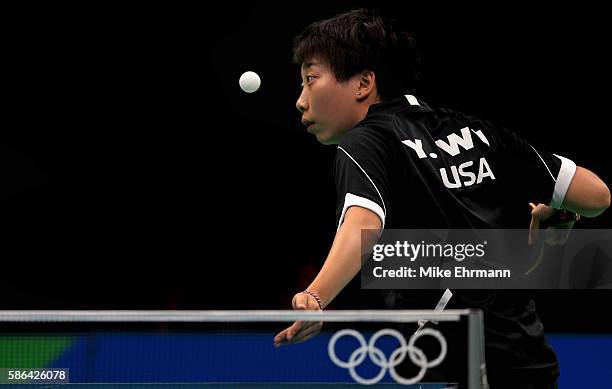 Yue Wu of the United States plays a Women's Singles first round match against Eva Odorova of Slovakia on Day 1 of the Rio 2016 Olympic Games at...