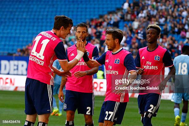 Goalgetter Michael Gregoritsch, Dennis Diekmeier, Nicolai Mueller and Gideon Jung of Hamburg celebration the Goal 1:0 for Hamburg during the...