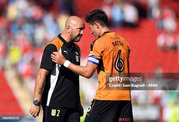 Walter Zenga manager / head coach of Wolverhampton Wanderers and Danny Batth of Wolverhampton Wanderers at full time during the Sky Bet Championship...