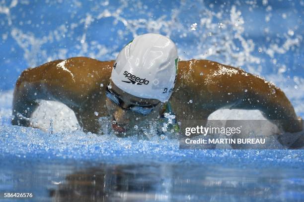Brazil's Daynara De Paula takes part in the Women's 100m Butterfly heat during the swimming event at the Rio 2016 Olympic Games at the Olympic...